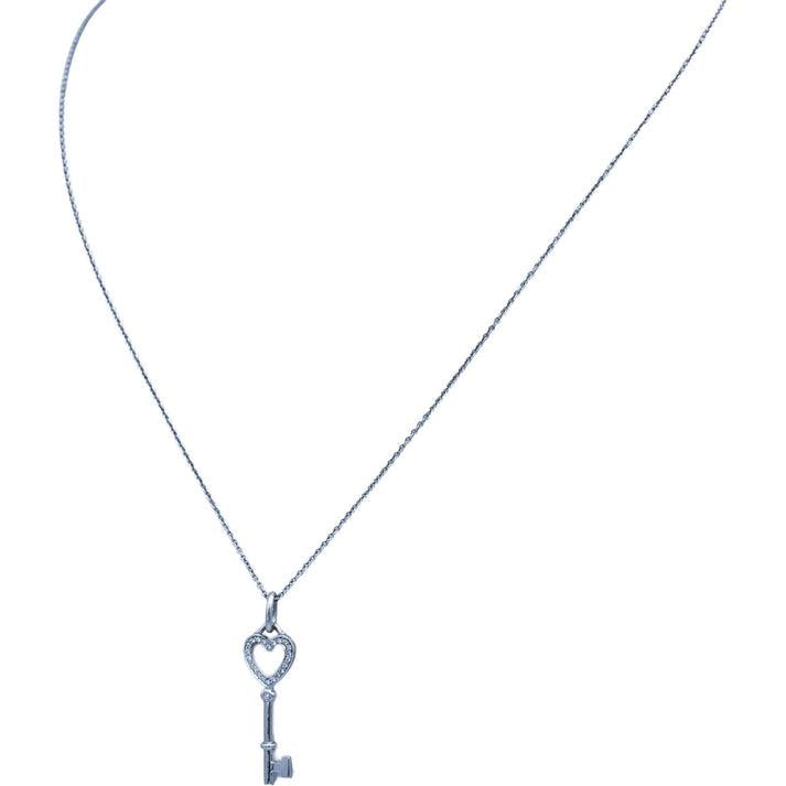 TIFFANY & CO. 18k White Gold VS Round Diamond Heart Key Pendant Necklace 0.12CT