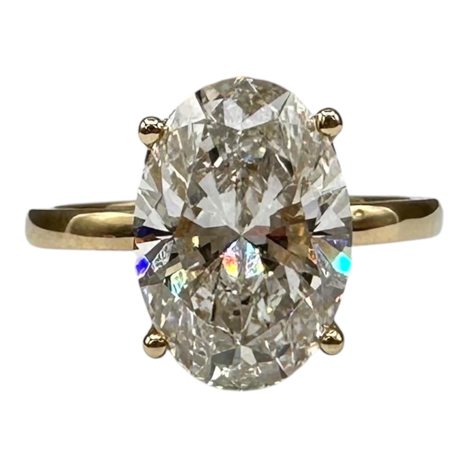 4.12ct Oval Lab Diamond Ring IGI F VS1 14K Yellow Gold Hidden Halo